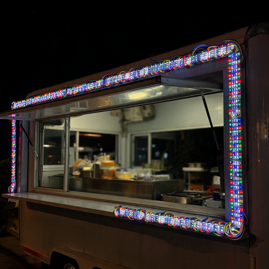 Modulos LED iluminando la ventana de un remolque de comida